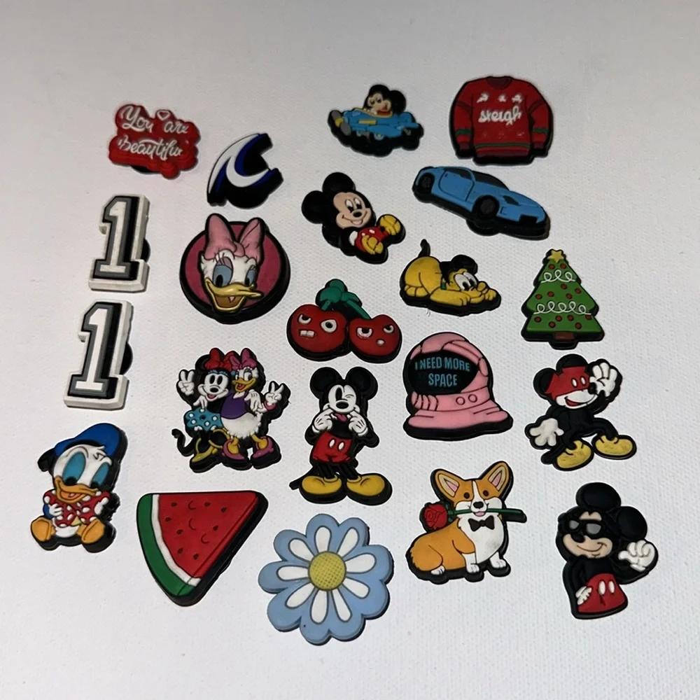 21 ASSORTED CROC CHARMS